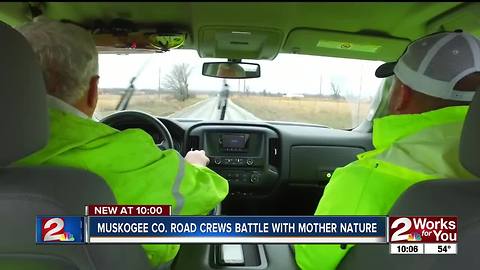 County road crews battle another round of rain