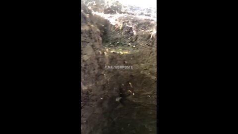 POV: Ukrainian soldier in a trench taking artillery fire