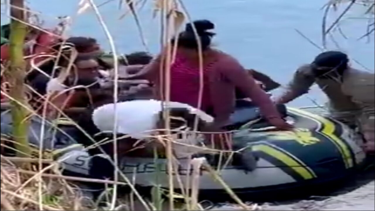 Video Shows Massive Group Of Migrants Being Guided Across Texas River