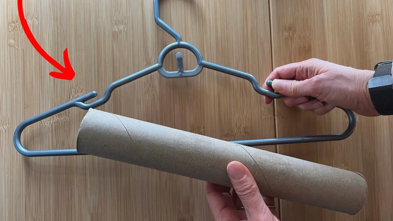 Slide a paper towel roll onto a hanger (this is BRILLIANT!)