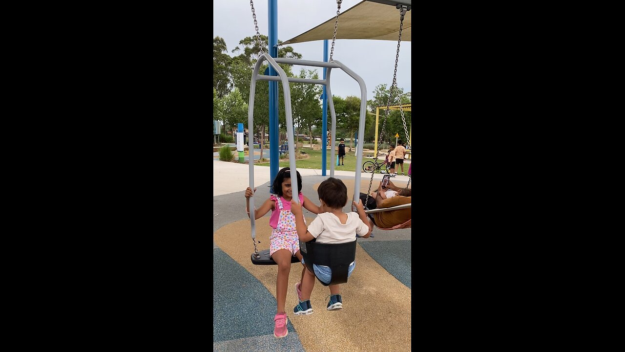 Elder sister trying to keep happy to young brother