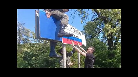 Russian Fighters Hung Up The Sign "Melitopol - Russia forever".