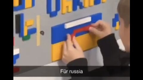 A Kid In A German School Puts Russian Flag Over Ukrainian Flag