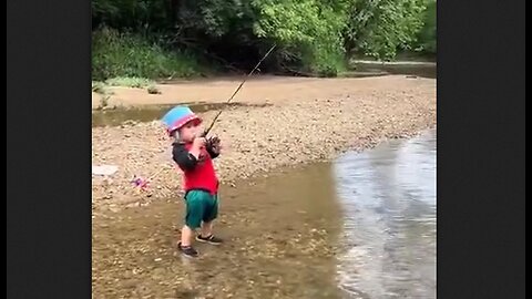 Little Man Catches A Fish