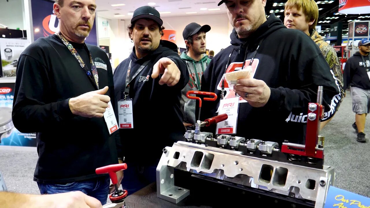 Street Outlaws Daddy Dave and Kamikaze Chris Fascinated By Valve Spring Compressor at PRI 2019