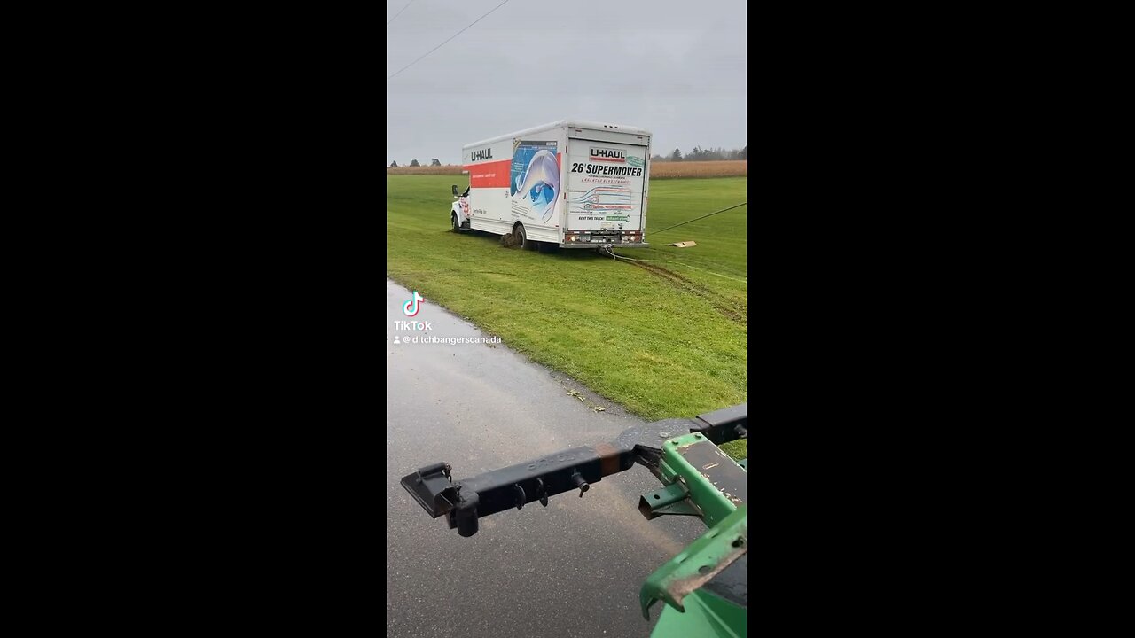 Chinese guy gets a U-Haul stuck.