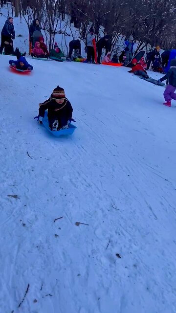Kid enjoying sliding