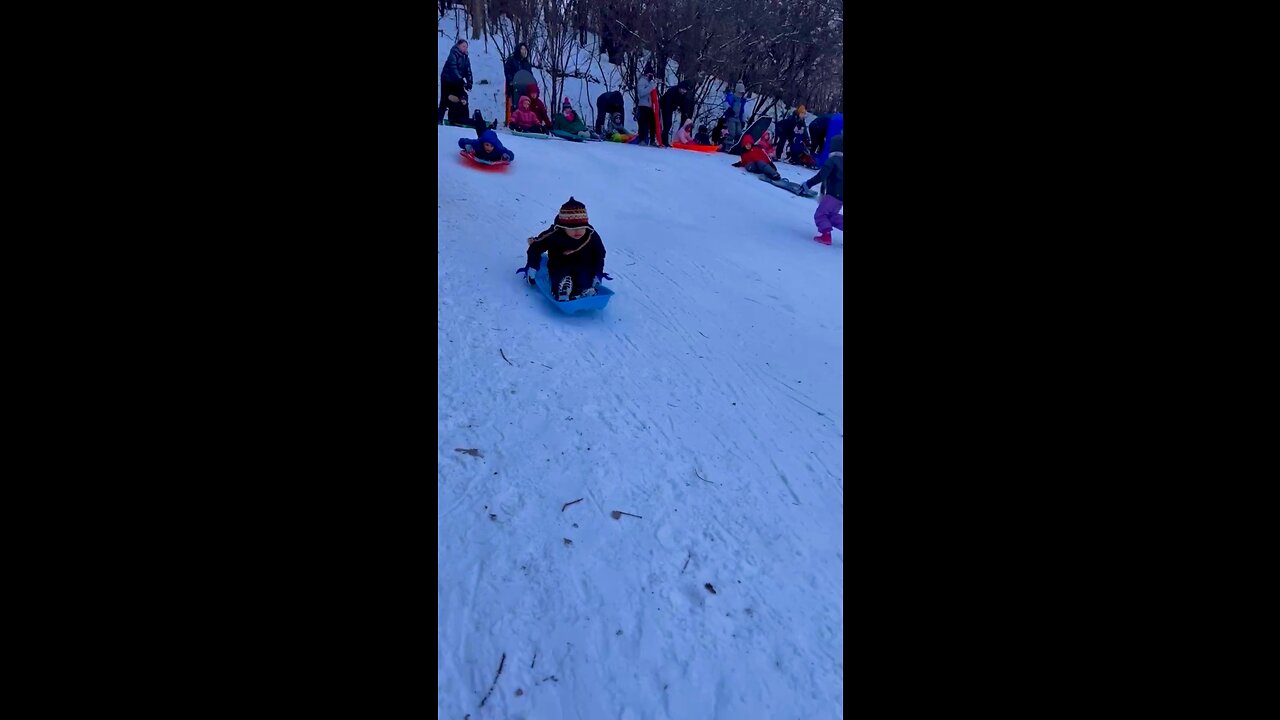 Kid enjoying sliding