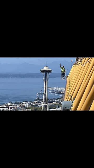 Pouring concrete on the roof of Seattle Washington’s second tallest building rainier tower: