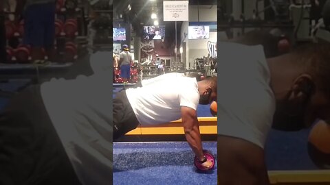 Straight Arm Planks with Ab Wheel