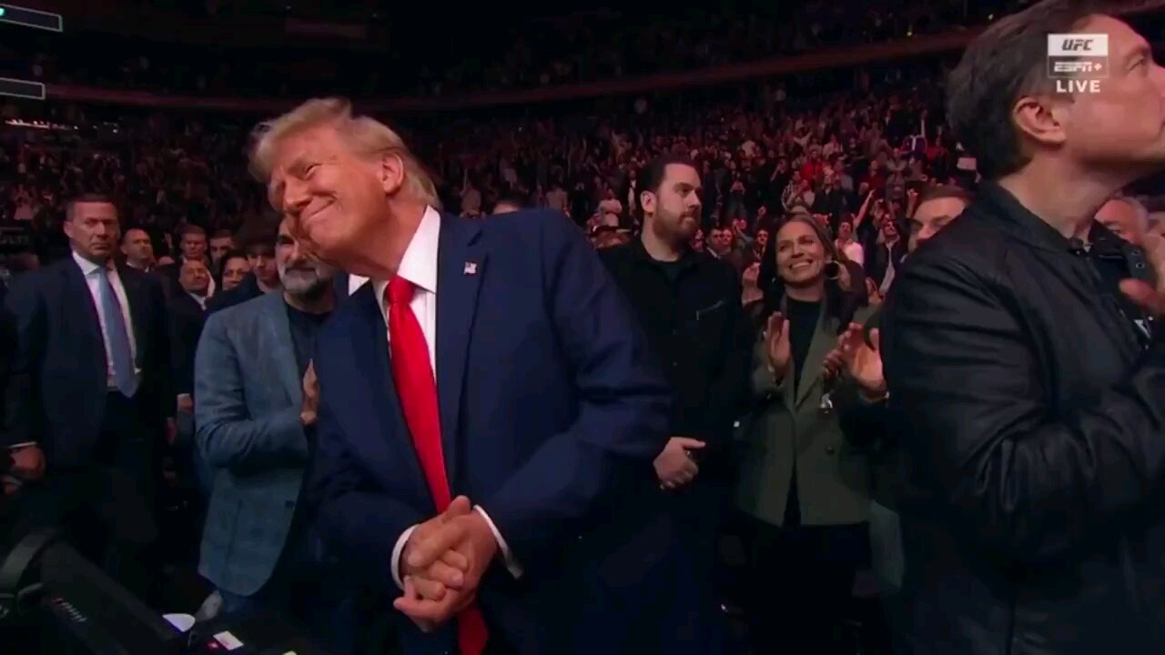 Jon Jones celebrates after defending his heavyweight title at UFC 309 by doing the Trump dance USA!