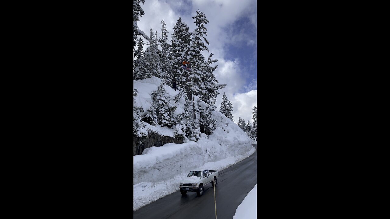 JD skis over Mt. Baker Road Gap