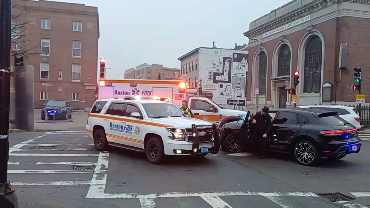 Boston police and EMS respond to a motor vehicle accident at Harrison and Dudley