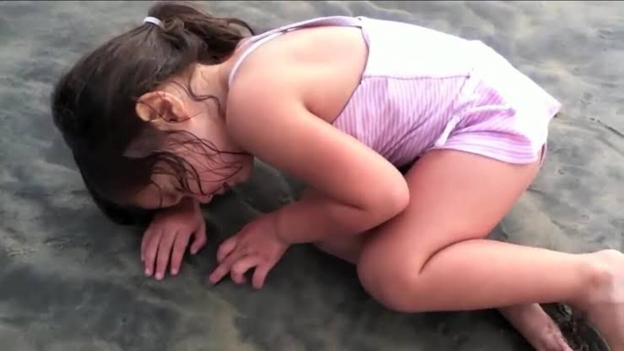 Small girl crying for nap on beach || funny video