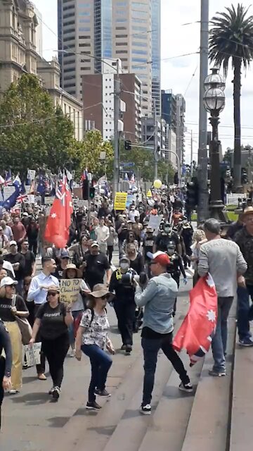 Chants of fu## Dan Andrews as tens of thousands pile
