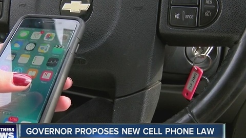 Gov. Cuomo's proposal: prohibit cell phone use while vehicle not in motion