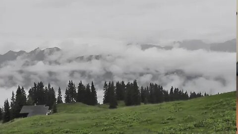 Alps; rain and clouds at Hochjoch, Montafon