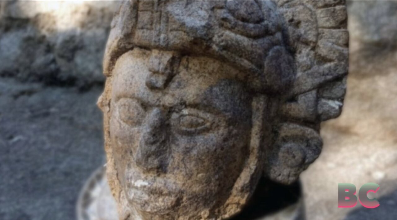 Archaeologists find strange Maya warrior statue with helmet shaped like snake