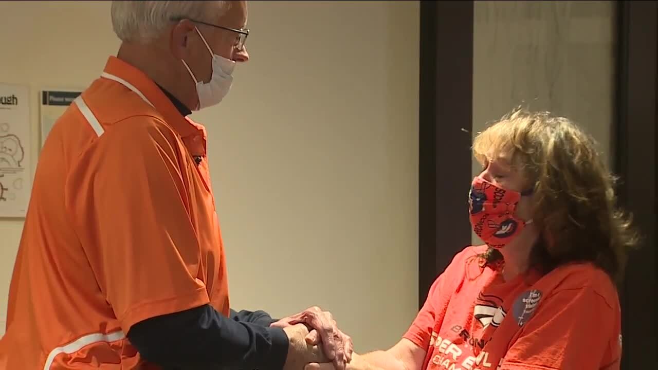 Broncos legend surprises 'biggest fan' after she donated kidney to her brother