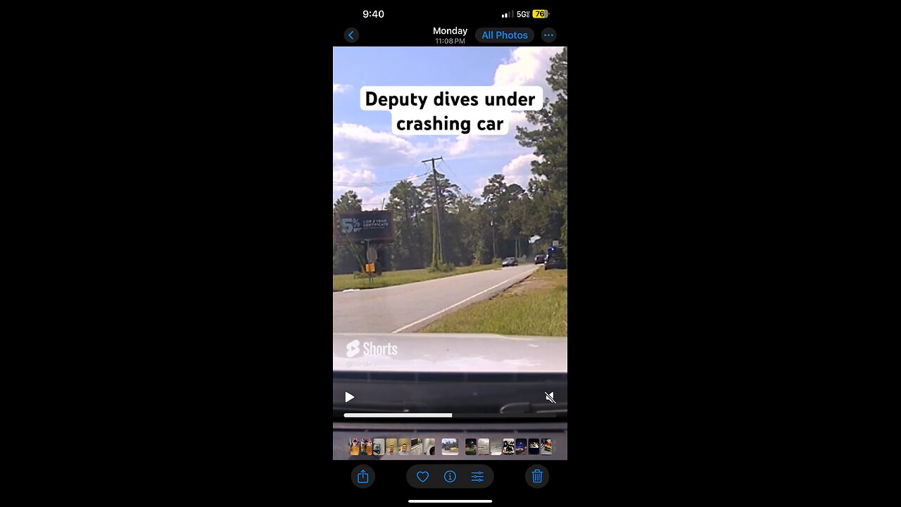 Police officer dives under rolling vehicle