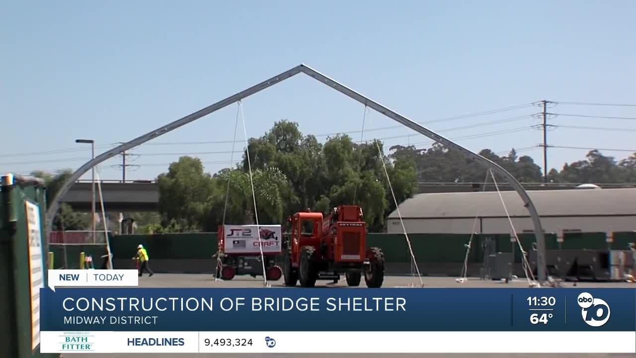 New bridge shelter being built in Midway District