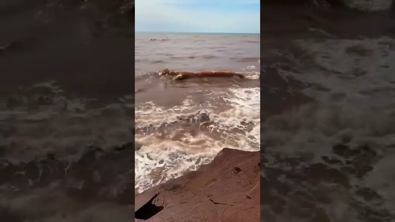 Watching the waves crash into each other