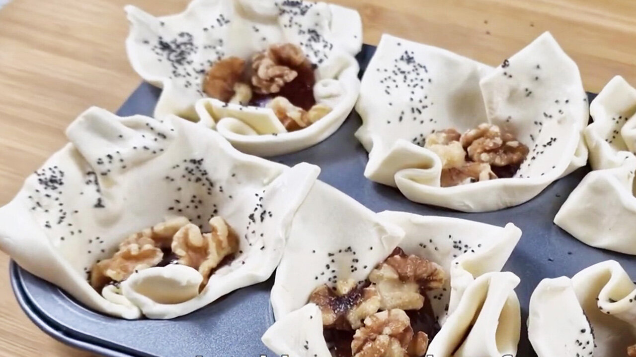 Basket of puff pastry stuffed with nuts and cheese