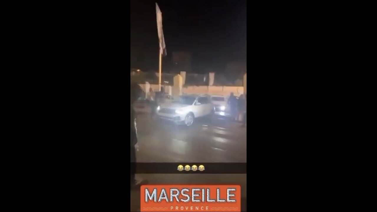 Rioters are stealing brand new cars at a dealership in Marseille France