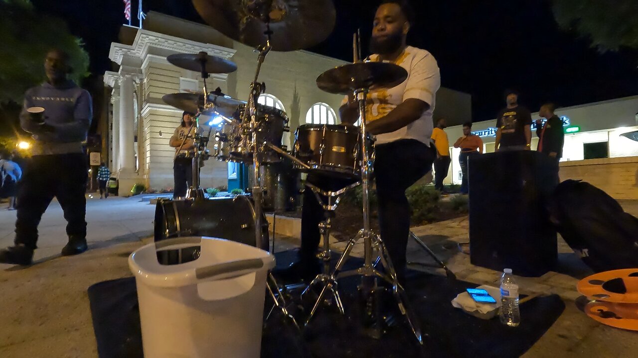 Drummer turns block into instant party!