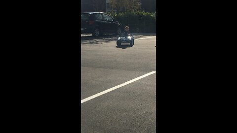 Little dude driving car