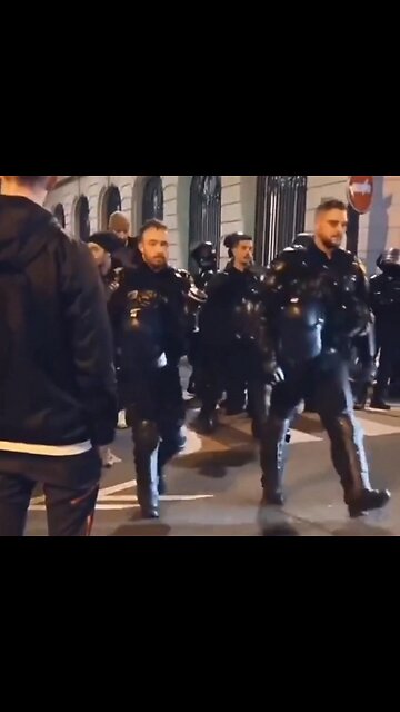 POLICE IN PARIS MARCH WITH PROTESTERS
