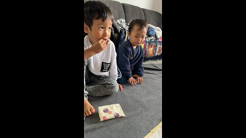 Baby eating japanese snacks so cute!!