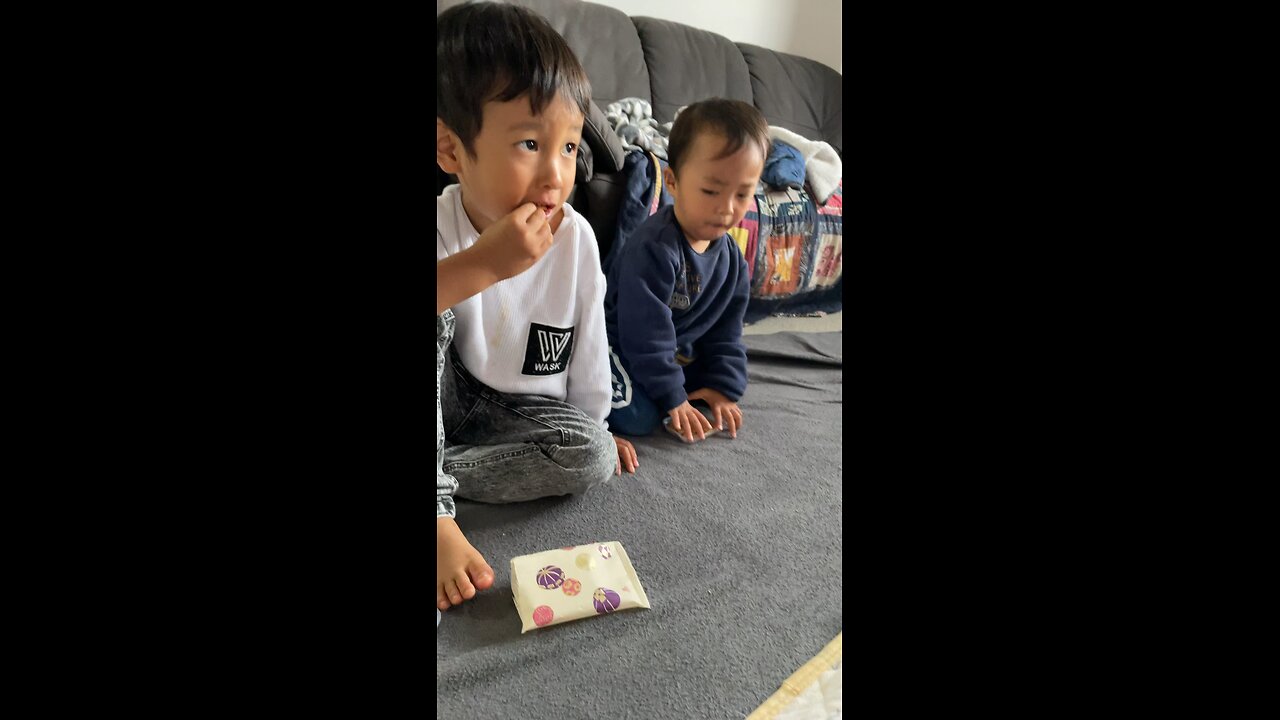 Baby eating japanese snacks so cute!!