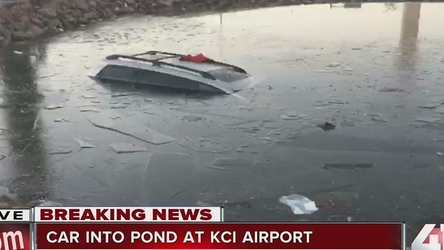 Car into pond at KCI Airport