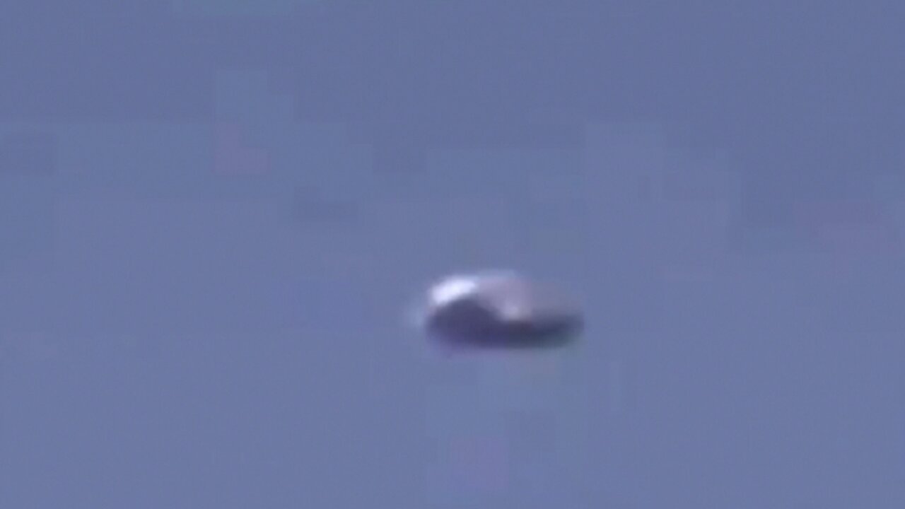 Silver Metallic UFO Caught on Film Over Mexico