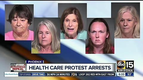 Police identify five arrested after protests at Sen. Flake's office.