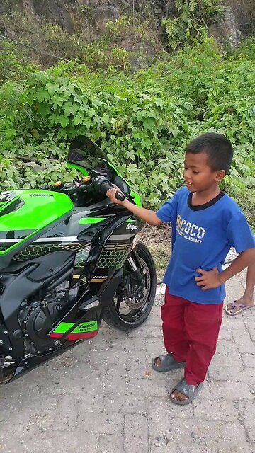 village kids entertainment playing zx25r