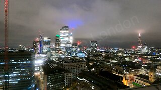 The City at night with rolling clouds