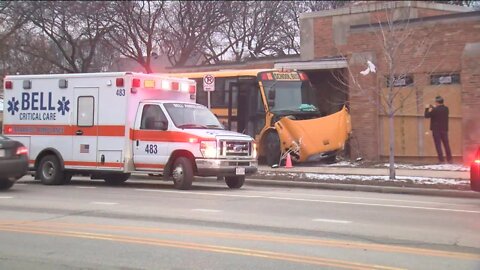 School bus, SUV crash into building near 55th and Burleigh