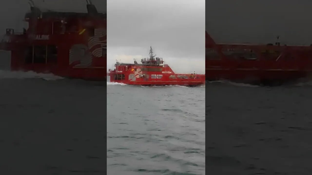 Passenger ferry overtaking car ferry