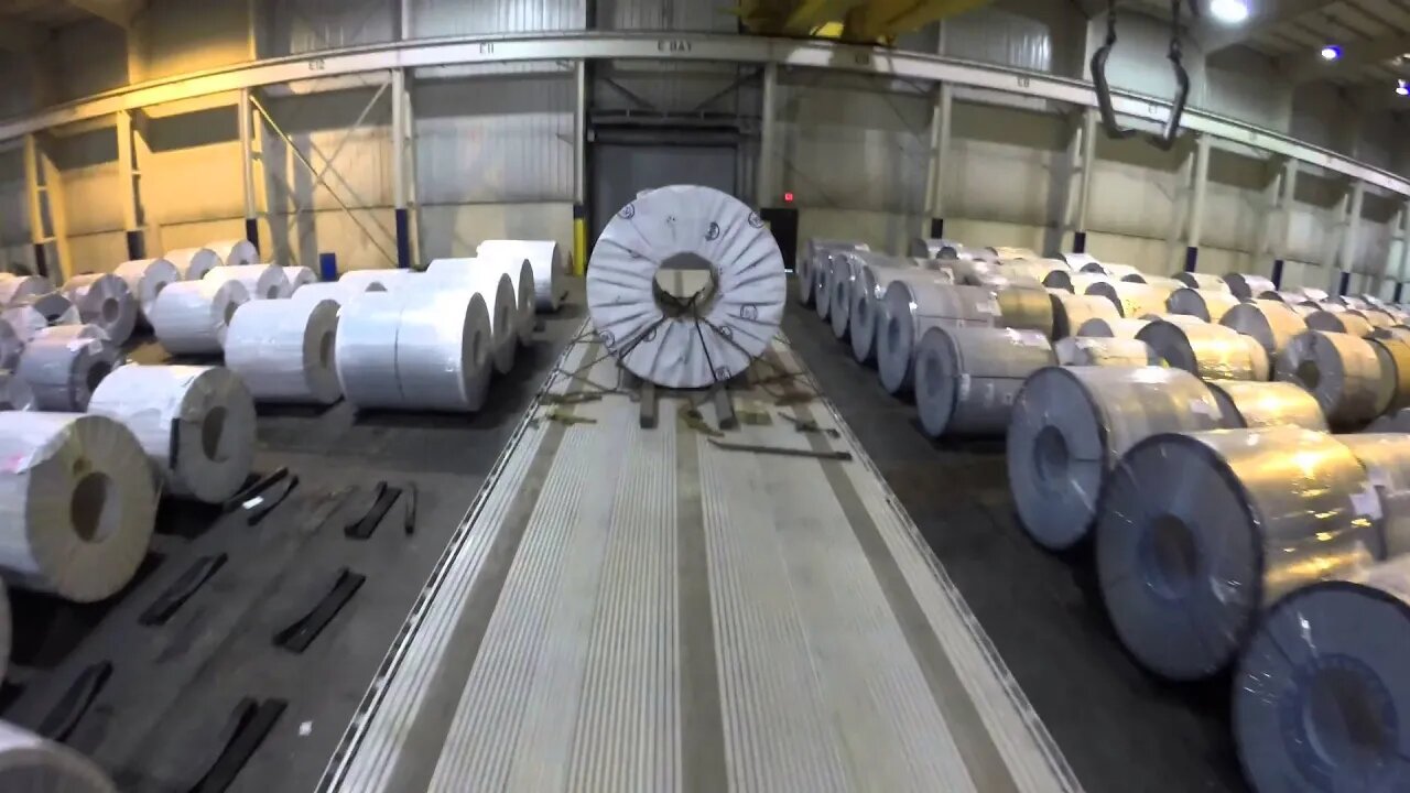 Flatbed securing a 42K Steel Coil