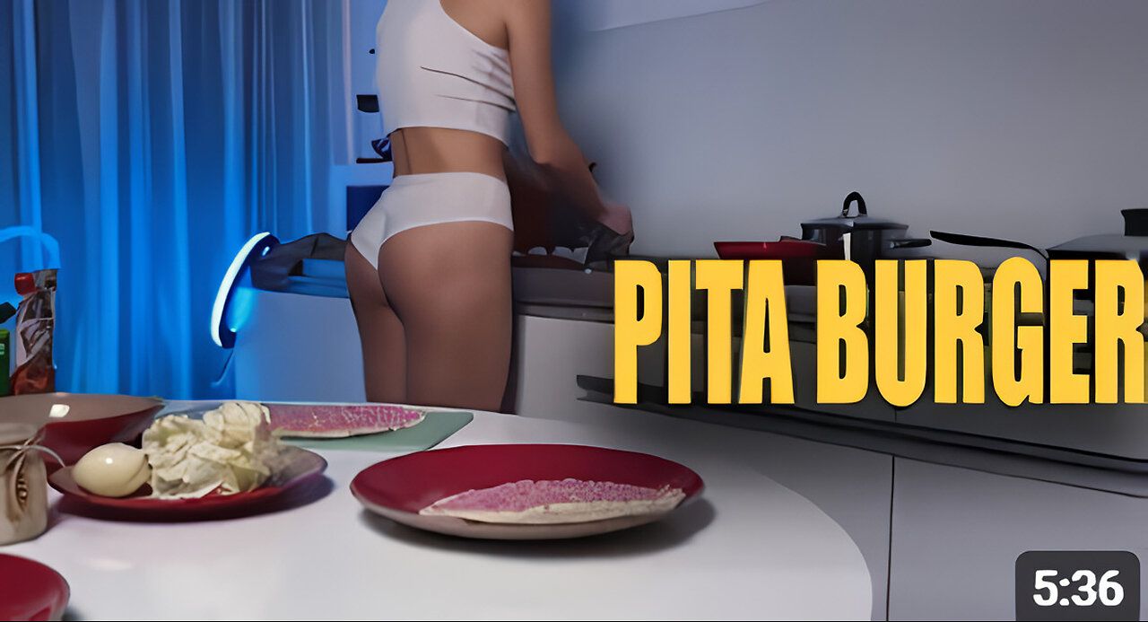 Girlfriend in top no bra cooking pita burger