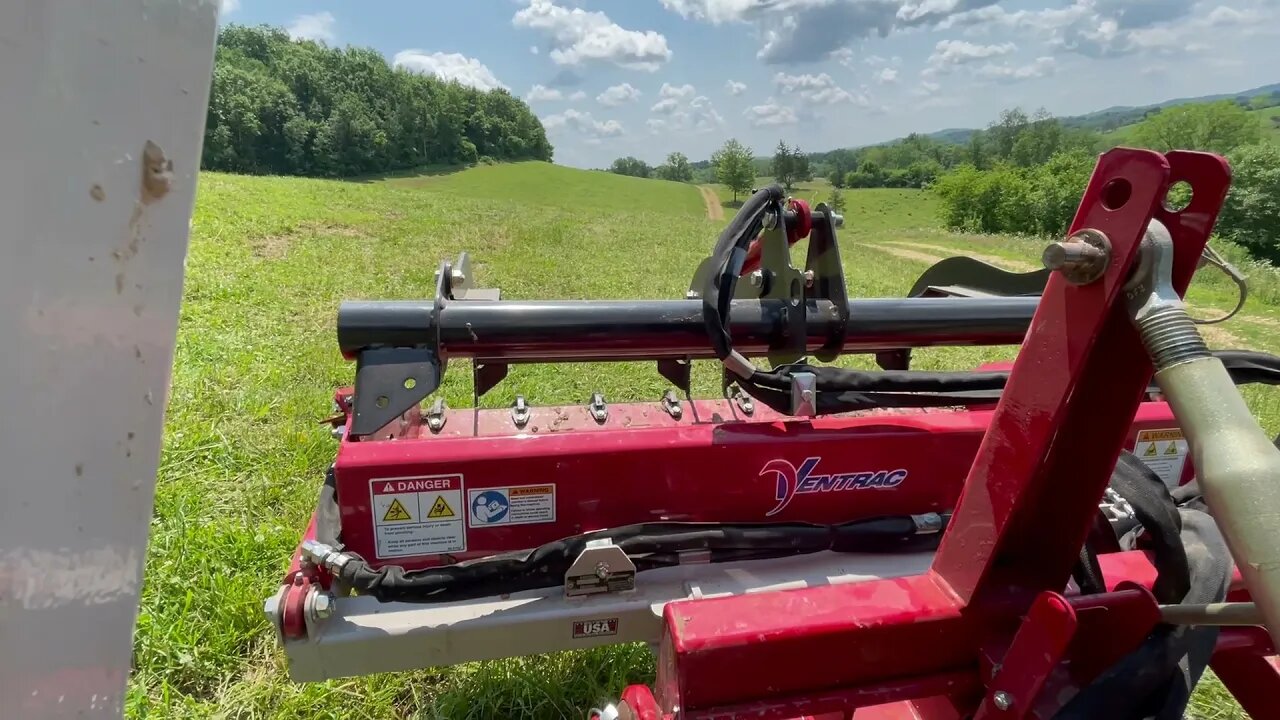 A log rolls down a hill and I use the 4500Y with the powerbucket.