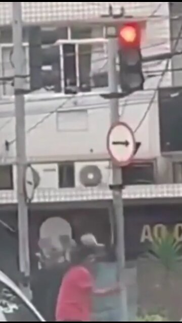 Enriching migrant hit by traffic lights.