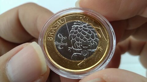 MOEDAS RARAS OLIMPÍADAS 2016 - MOEDA MASCOTE OLÍMPICO VINICIUS E PARALÍMPICO TOM - DETALHES E VALOR