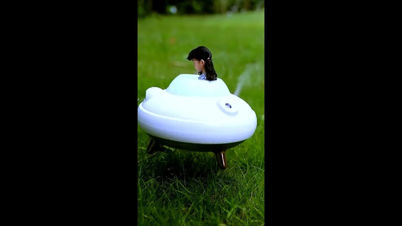 Baby's flying saucer is flying
