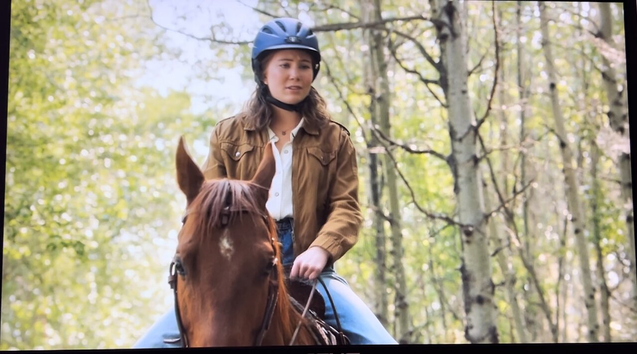 Heartland 17X03 Spoiler 1: Katie Riding Shadow and Someone on a Dirt bike Passes Them