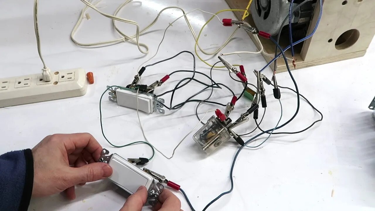 Induction motor NVR switch and starting circuit