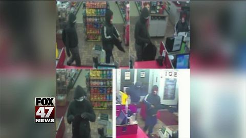 Pictures released of 2 men who robbed QD