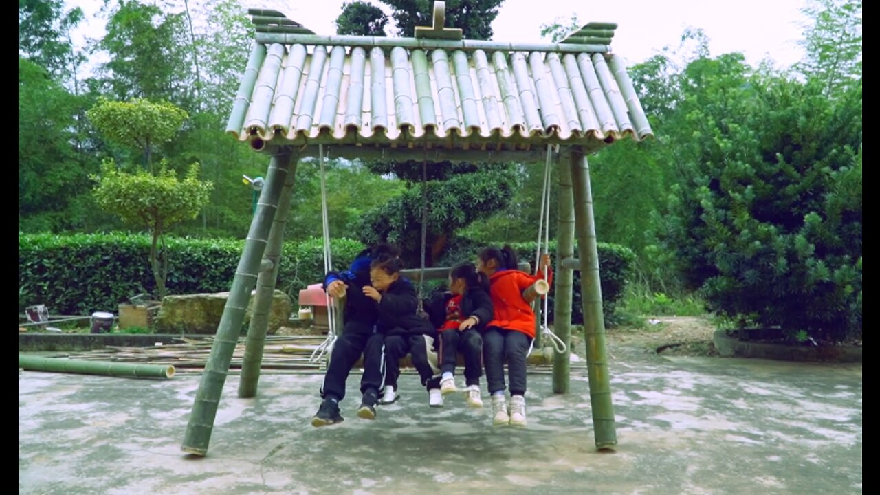 Uncle made the swing of hanging chair cradle and gave it to the kindergarten in the village